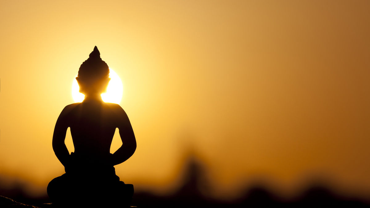 buddha silhouette and real sunrise